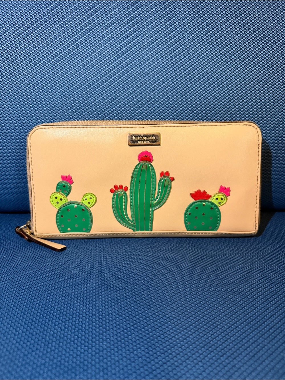 Kate Spade New Horizons Cactus Neda Zip Wallet in the "cashew" color